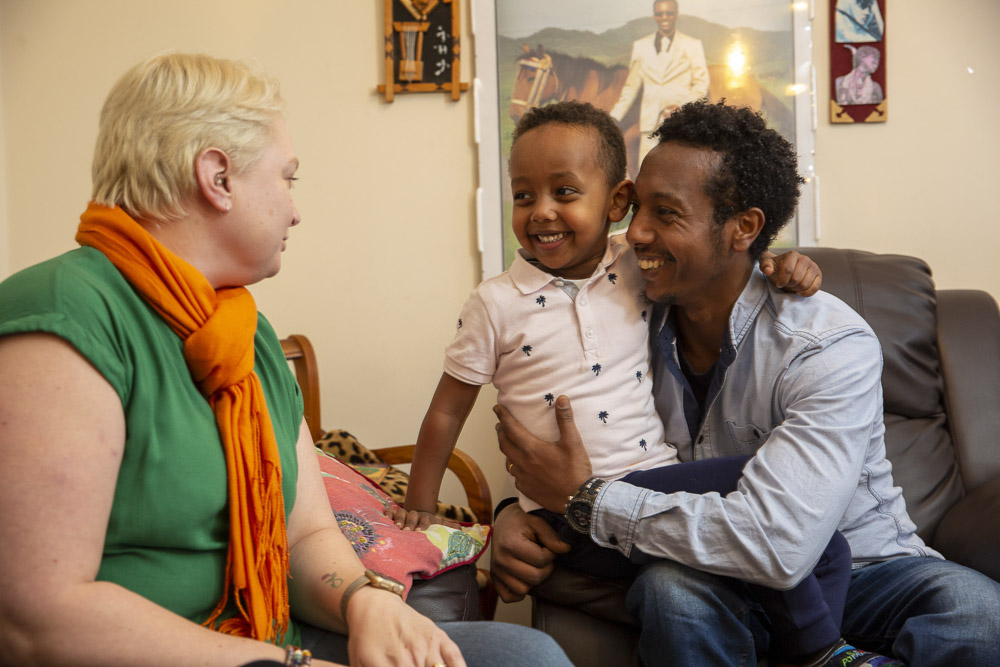 parent, volunteer and child